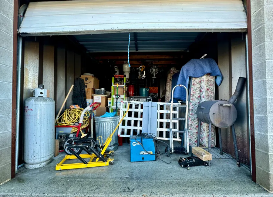 Cleared garage with stored household items loaded for removal in San Benito Texas